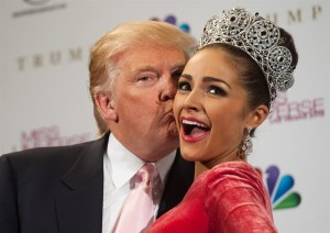 Donald Trump with 2012 Miss Universe Olivia Carpo of the United States.