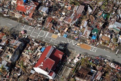 File photo: a message in chalk from typhoon Haiyan victims