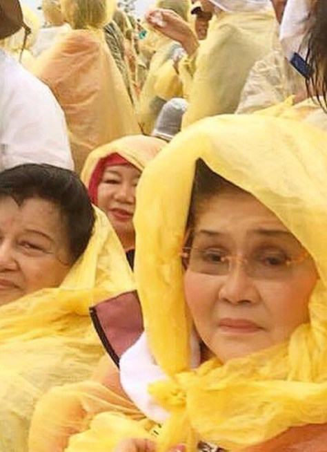 Imelda Marcos in yellow